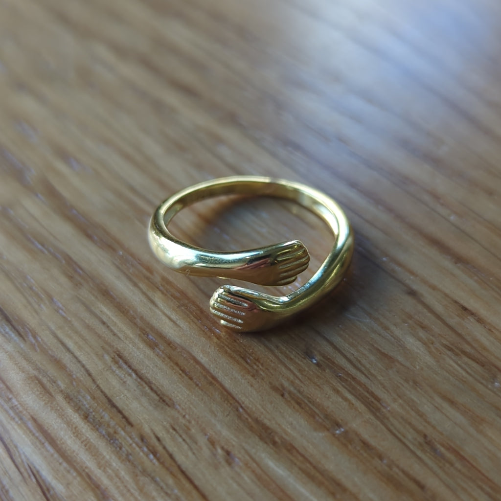 Self hug gold plated sterling silver ring