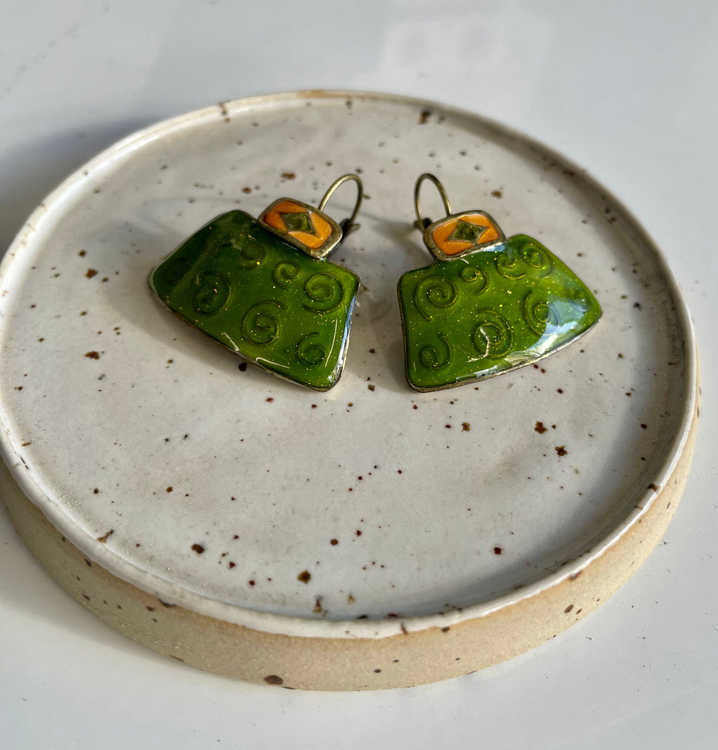 Green vintage earrings with swirls