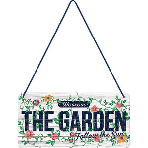 We Are In The Garden tin sign